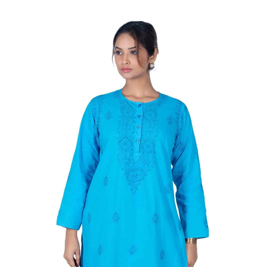 Woman wearing a blue kurta with black pants on a white background